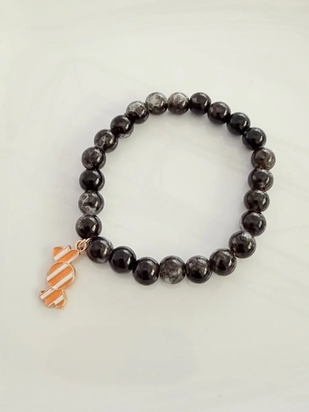 Black Beaded Bracelet with Orange Candy Charm Festive Handmade Jewelry